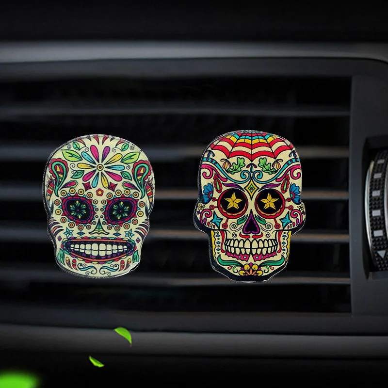 Skull-shaped acrylic car air freshener vent clip with mixed fragrance, 3.5-4.5 cm, colour option shown.