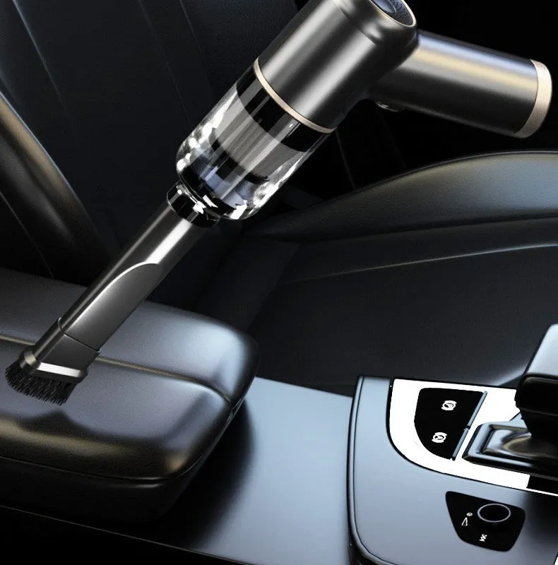Black wireless handheld car vacuum cleaner with multiple nozzle attachments on charging cable