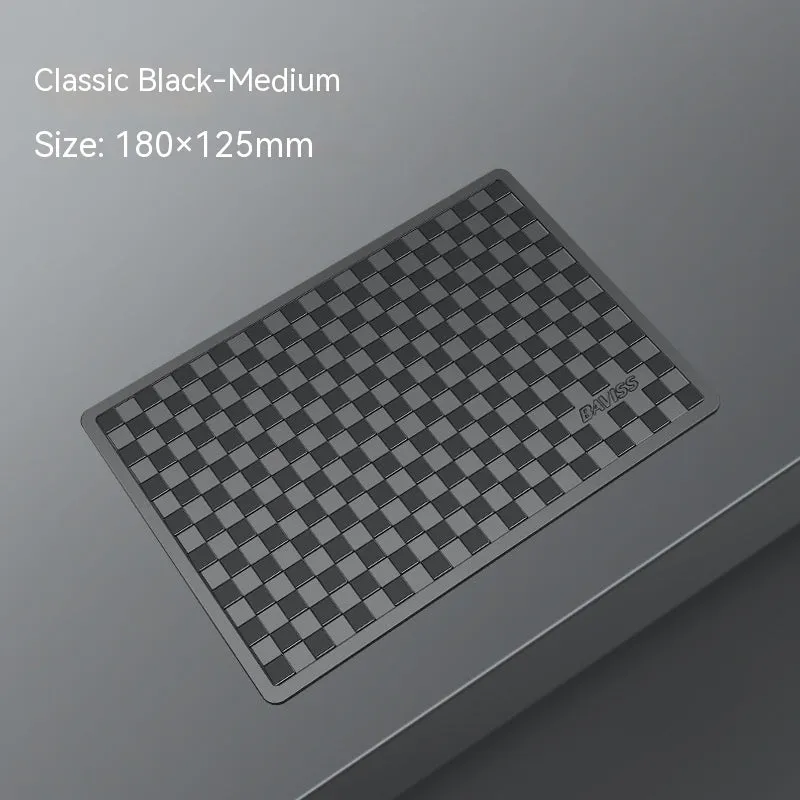 PU car dashboard anti-slip pad for mobile phone in Classic Black, showing textured surface and fit on instrument panel