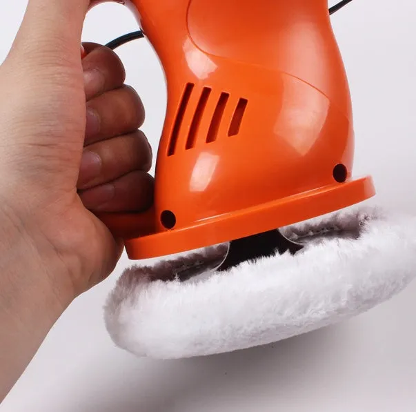 12V car polishing machine with ergonomic handle, thick cigarette lighter cord, black and orange colours