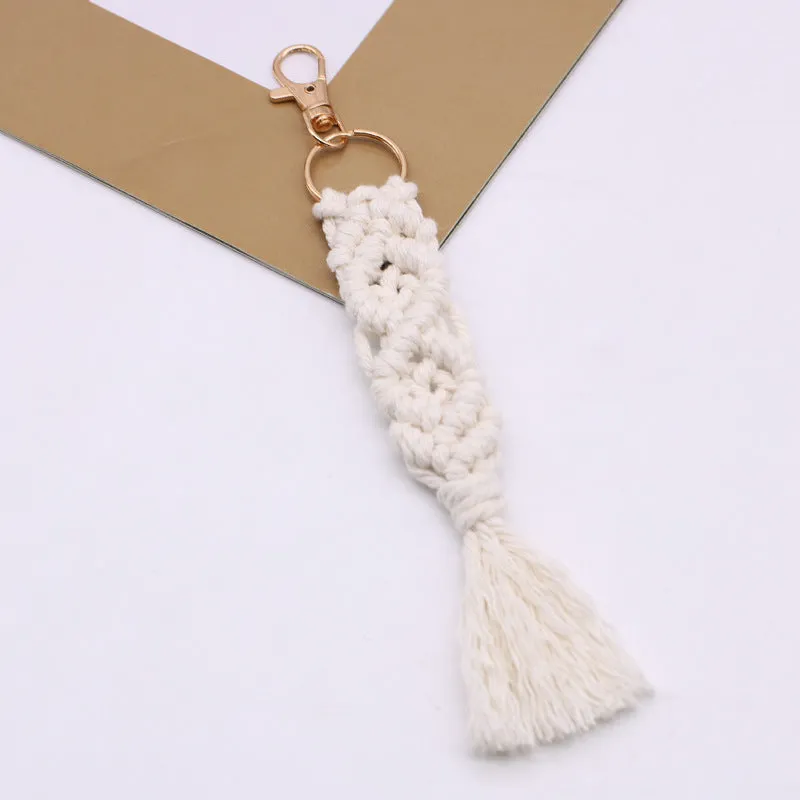 Hand-woven cotton tassel key chain in eight colours including brick red and rose pink for car keys and bag ornaments