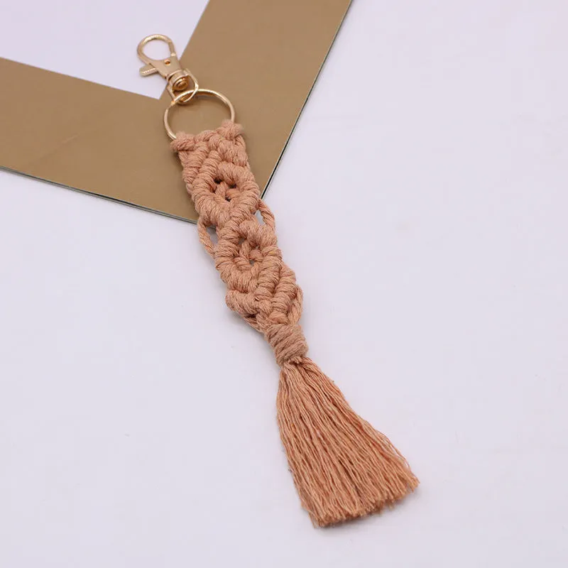 Hand-woven cotton tassel key chain in eight colours including brick red and rose pink for car keys and bag ornaments