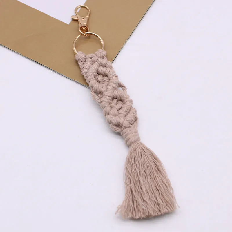 Hand-woven cotton tassel key chain in eight colours including brick red and rose pink for car keys and bag ornaments
