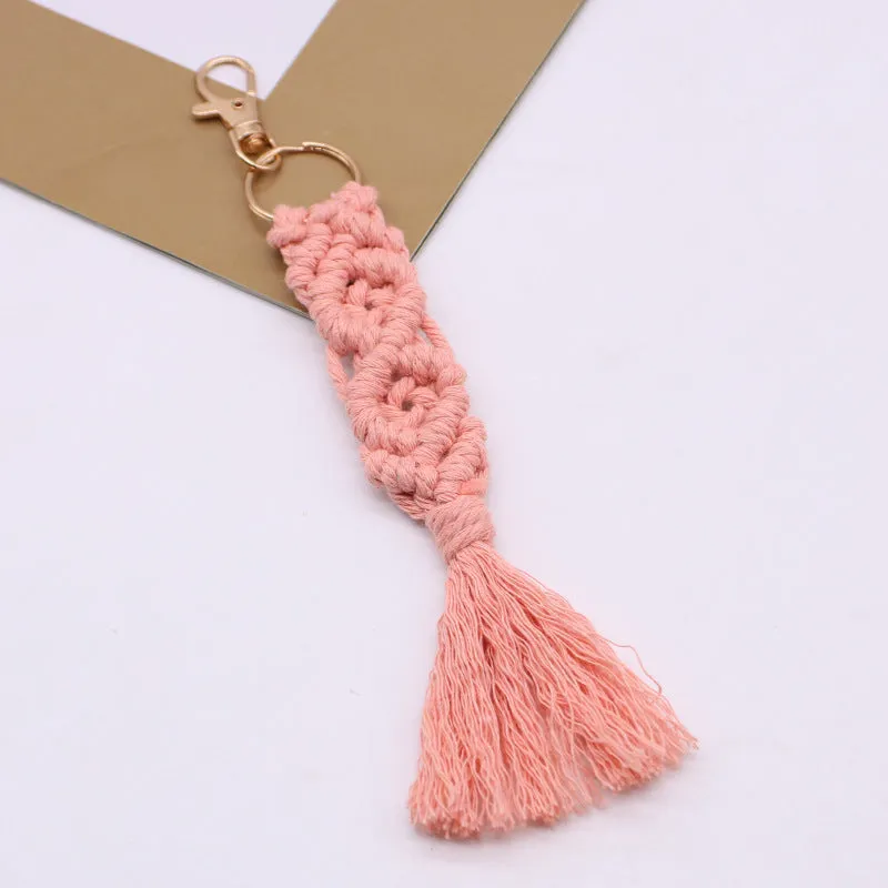 Hand-woven cotton tassel key chain in eight colours including brick red and rose pink for car keys and bag ornaments