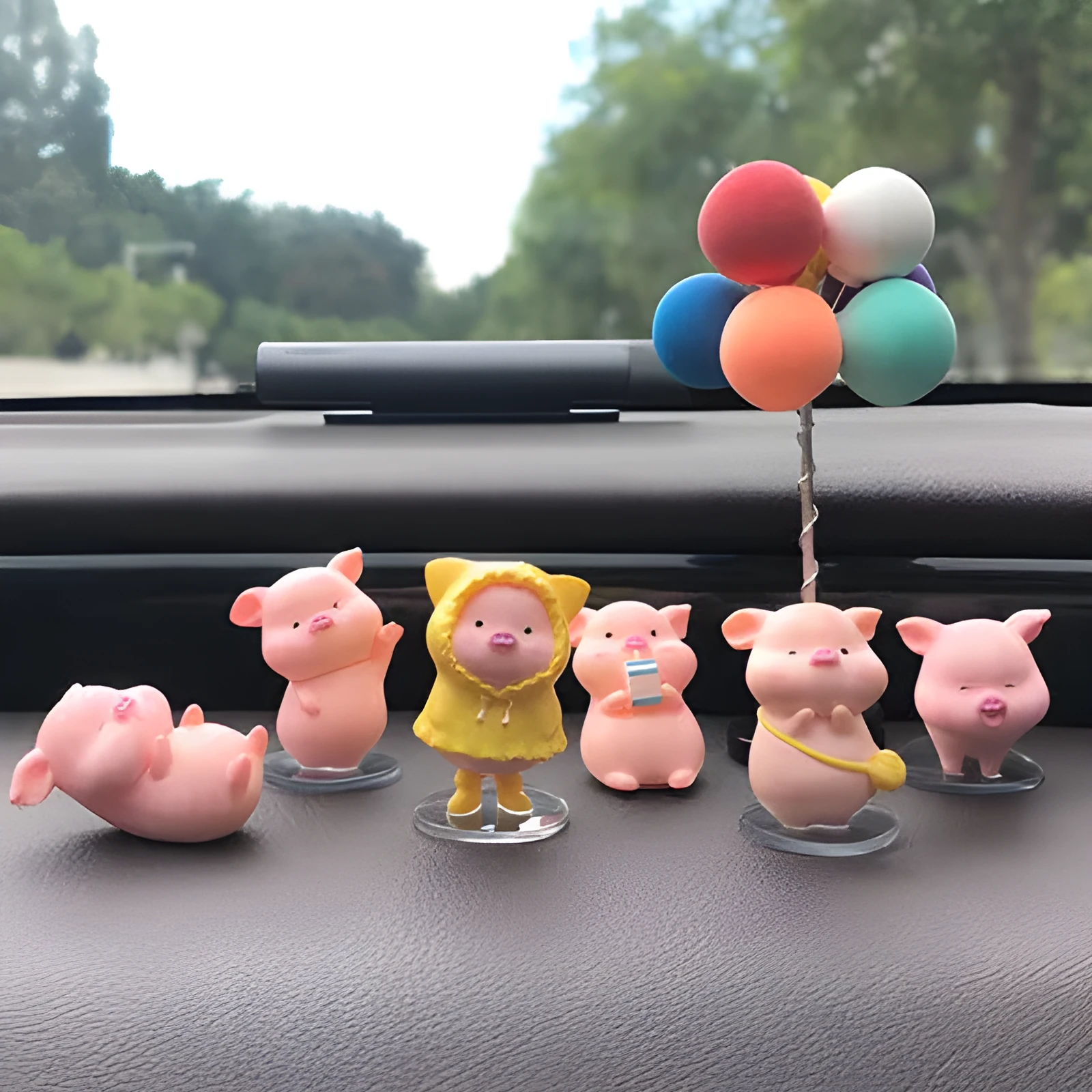 Six little pink resin pigs with colourful balloons on a rectangular anti-skid pad, cartoon car decoration