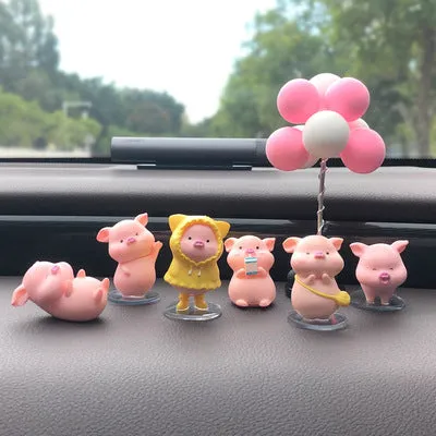 Six little pink resin pigs with colourful balloons on a rectangular anti-skid pad, cartoon car decoration
