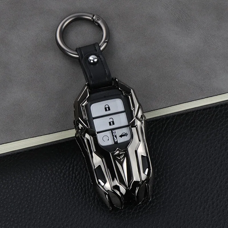 Black zinc alloy car key cover with highlight polish finish protecting a key fob