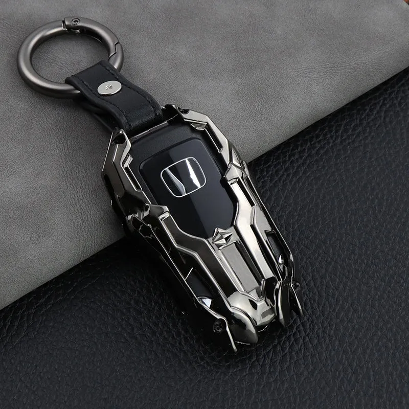 Black zinc alloy car key cover with highlight polish finish protecting a key fob