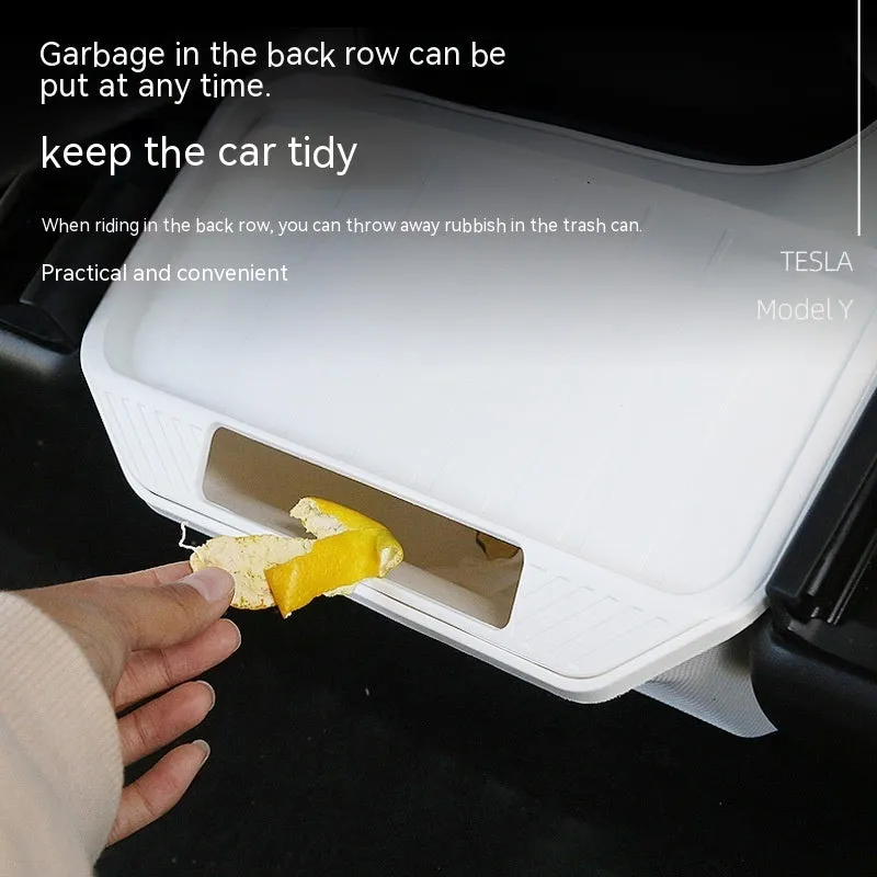 Black rectangular plastic rear middle storage box with handle on car seat