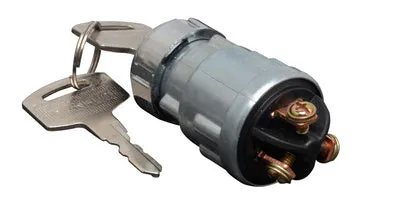 Copper vehicle ignition switch with key for trucks and forklifts.