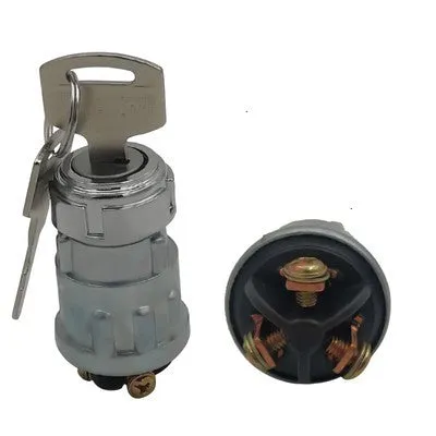 Copper vehicle ignition switch with key for trucks and forklifts.