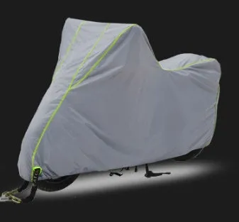Thick nylon PVC coated motorcycle cover in black green, size L, on a dark background