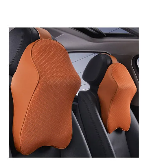 Memory foam car neck pillow with ergonomic shape, adjustable strap, and polyester cover on a car seat