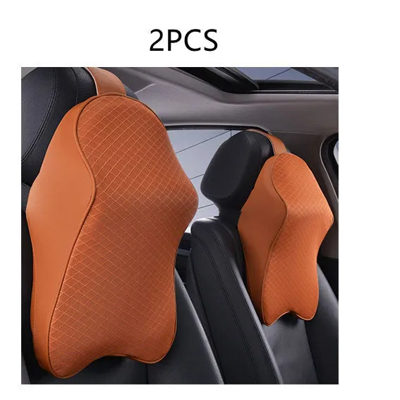 Memory foam car neck pillow with ergonomic shape, adjustable strap, and polyester cover on a car seat