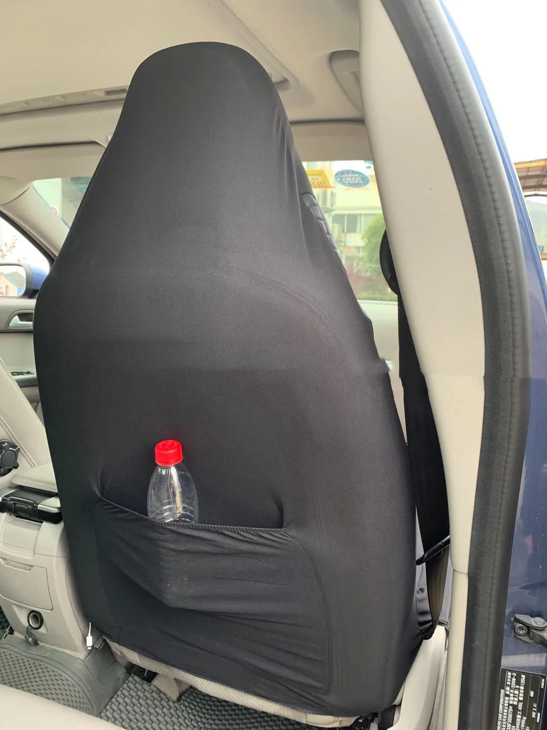 Black quilted automotive seat cover with PU and polyester fabric, plastic hooks
