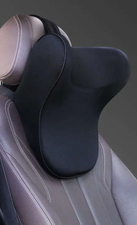 Car headrest and lumbar support cushion set in gray on a car seat