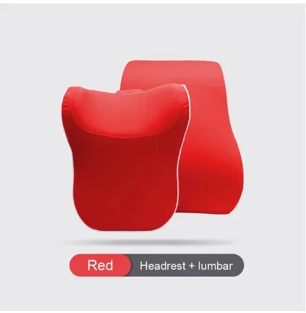 Car headrest and lumbar support cushion set in gray on a car seat