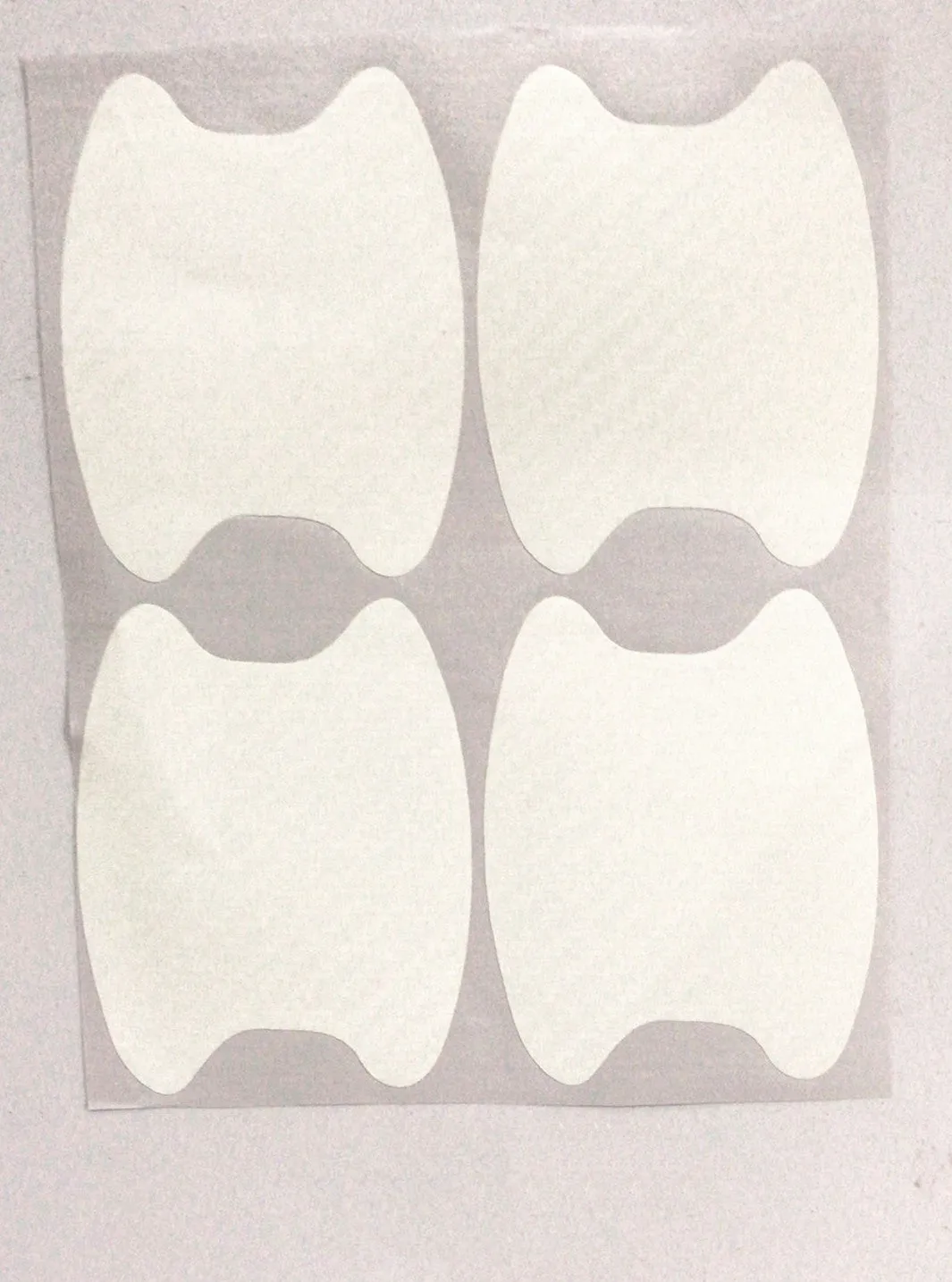 4-piece carbon fibre car handle sticker set in black for scratch-resistant door handle protection
