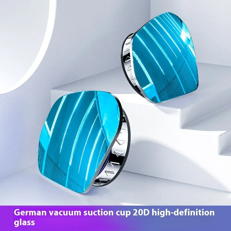 Pair of 360-degree wide-angle suction cup car mirrors in black, white, and silver on a car windscreen