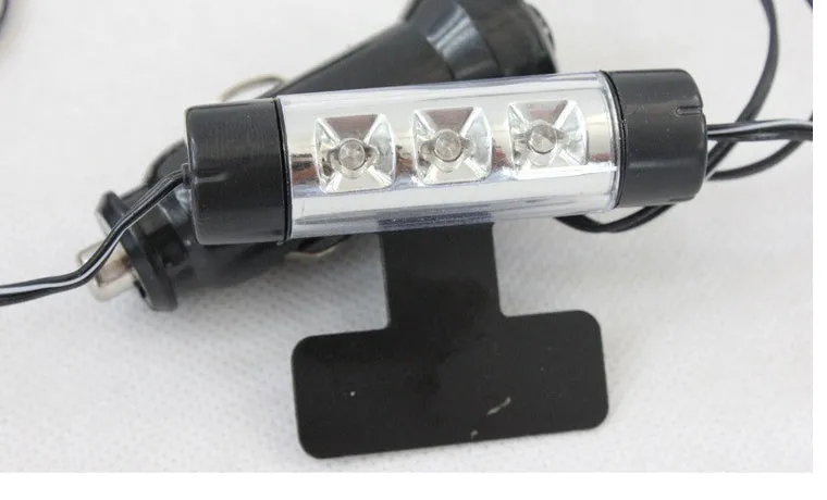 Compact blue LED car interior footwell light with 60mm length and 16mm diameter, rotating head and cable