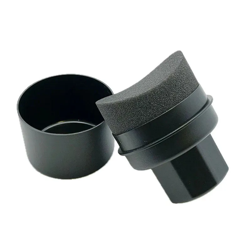 Black and red car tyre polishing sponge brushes with lids on a white background.