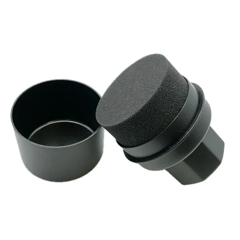 Black and red car tyre polishing sponge brushes with lids on a white background.