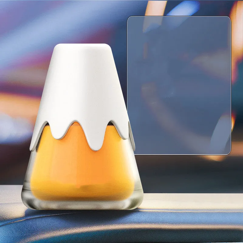 Glass car aromatherapy diffuser in purple, lime, laurel, and blue colour options on a white background.