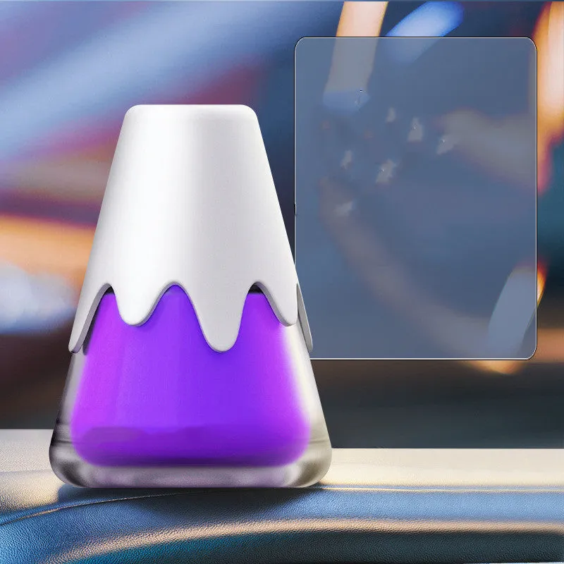Glass car aromatherapy diffuser in purple, lime, laurel, and blue colour options on a white background.