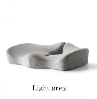 Cotton memory foam seat cushion in light gray on a wooden chair, measuring 46x32cm