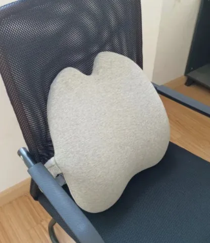 Cotton memory foam seat cushion in light gray on a wooden chair, measuring 46x32cm