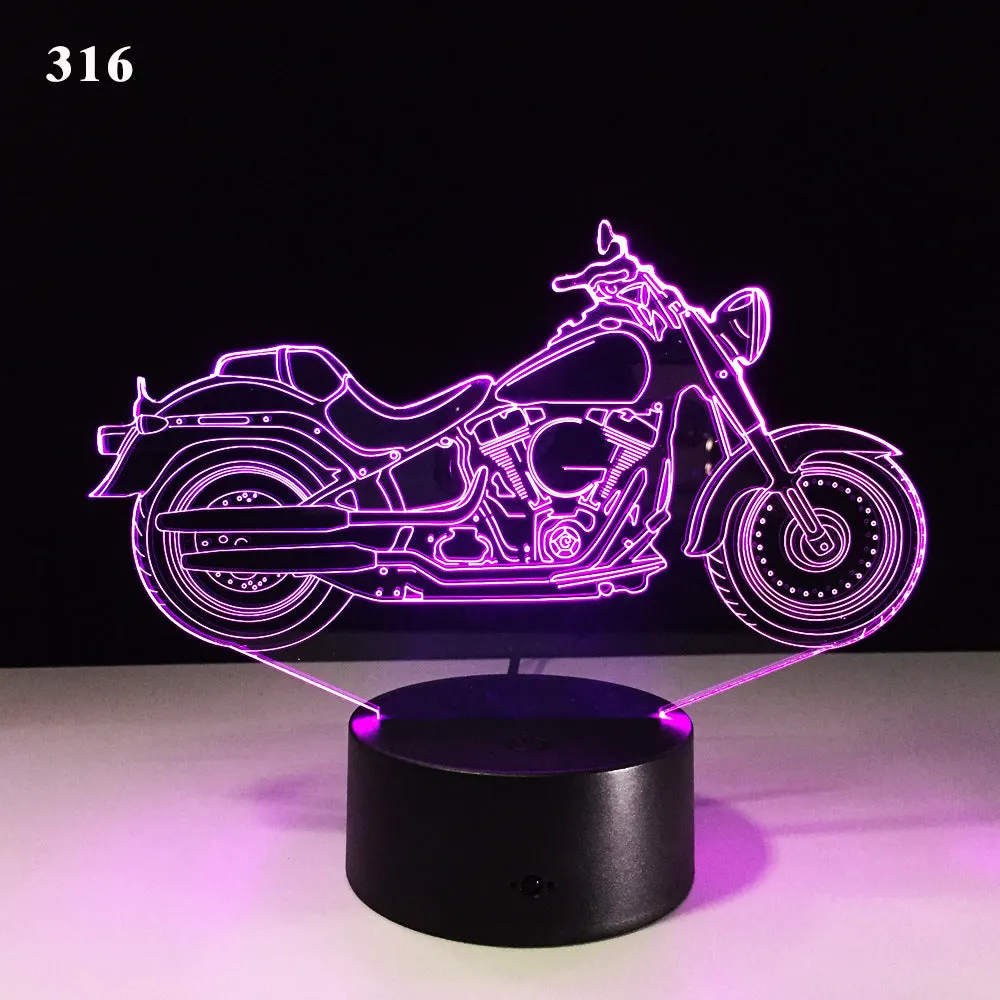 Motorcycle LED desk lamp with black base and acrylic shade on a wooden desk, 220x130x90mm