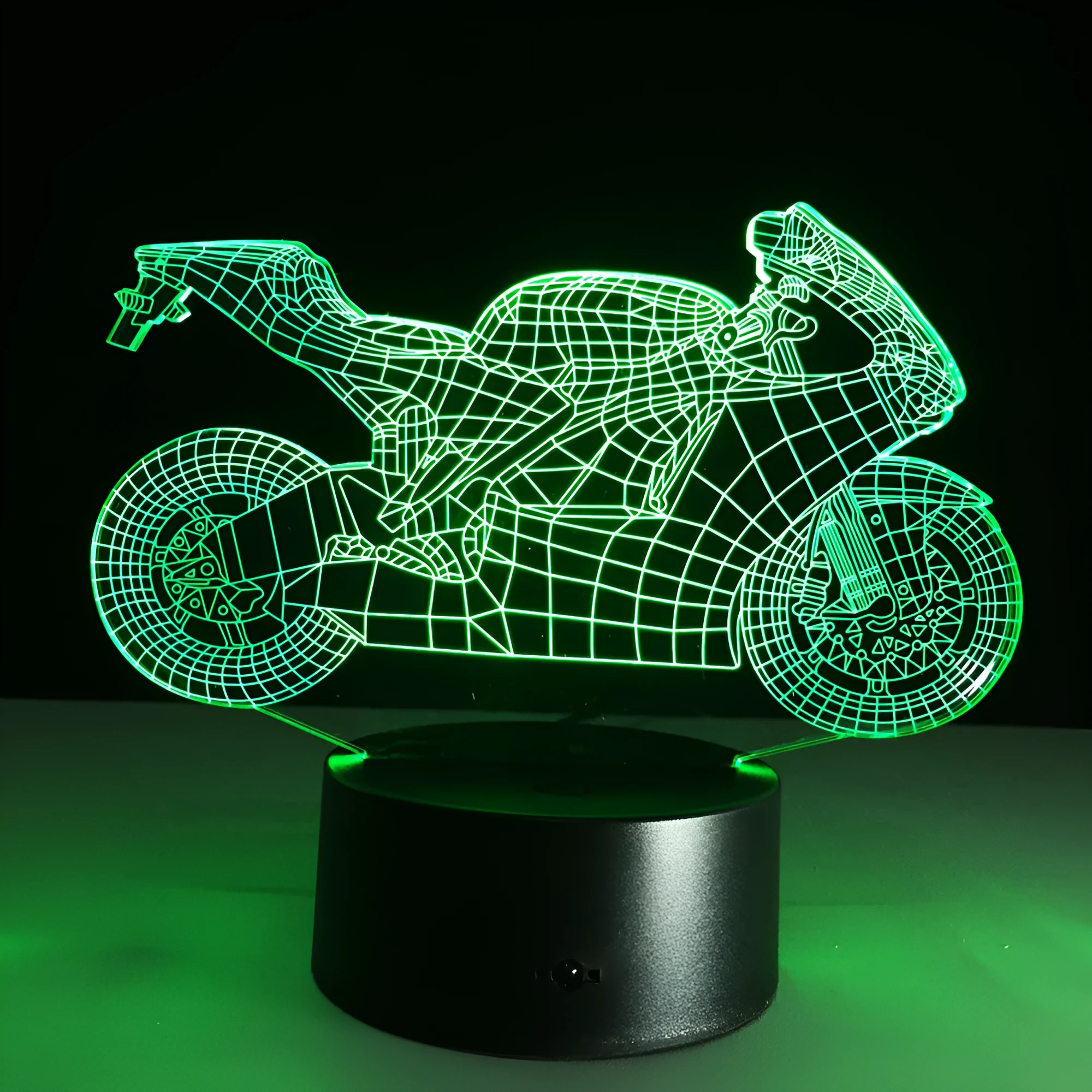 Motorcycle LED desk lamp with black base and acrylic shade on a wooden desk, 220x130x90mm