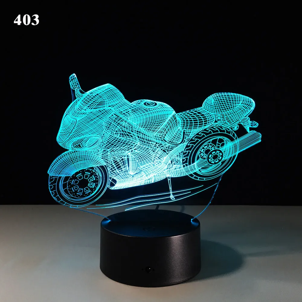 Motorcycle LED desk lamp with black base and acrylic shade on a wooden desk, 220x130x90mm