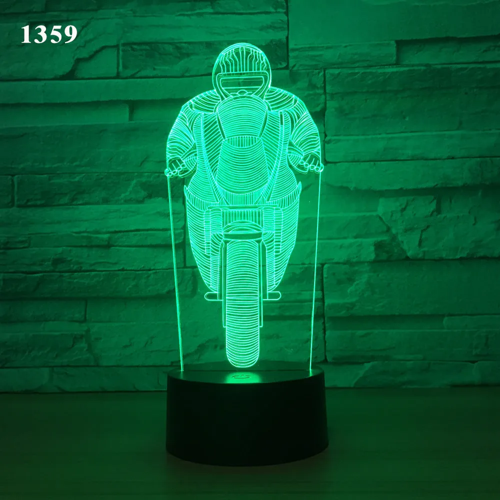 Motorcycle LED desk lamp with black base and acrylic shade on a wooden desk, 220x130x90mm