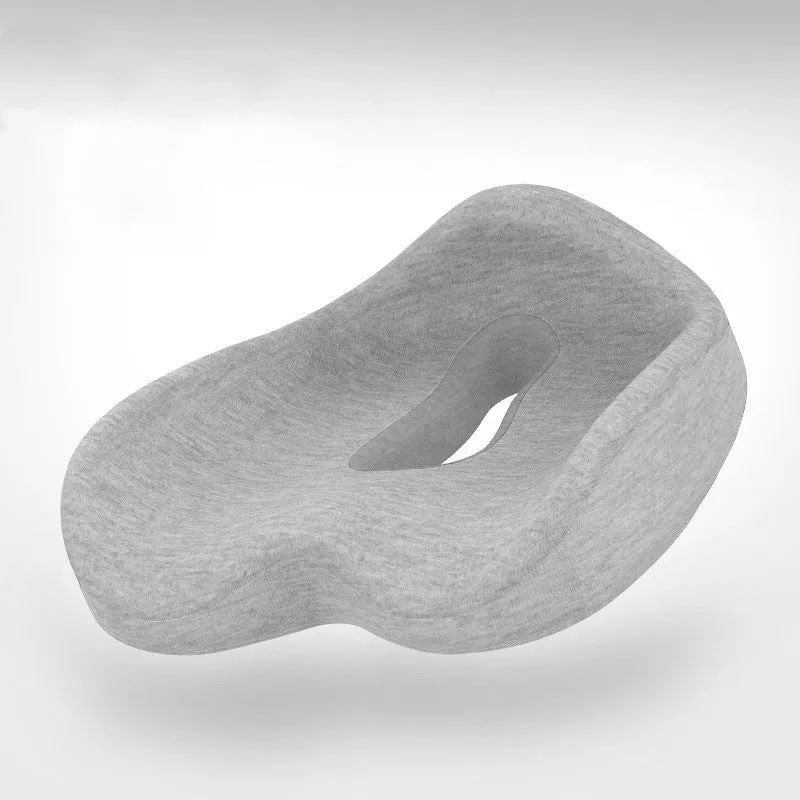Memory foam seat cushion in light grey and navy blue on an office chair, 43x36x14cm