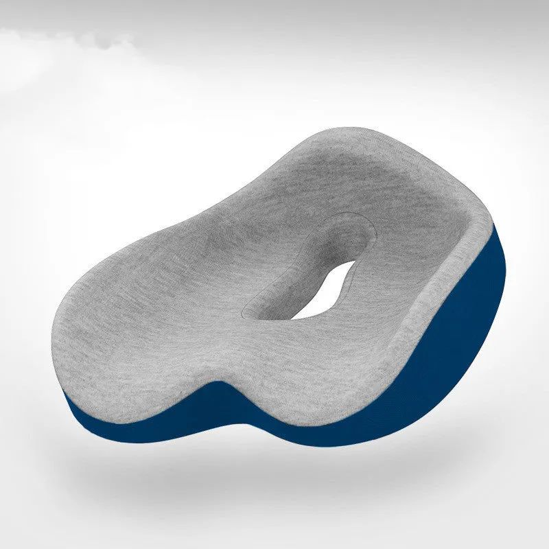 Memory foam seat cushion in light grey and navy blue on an office chair, 43x36x14cm