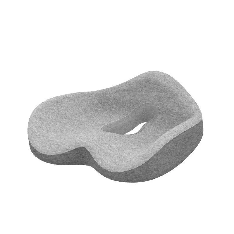 Memory foam seat cushion in light grey and navy blue on an office chair, 43x36x14cm