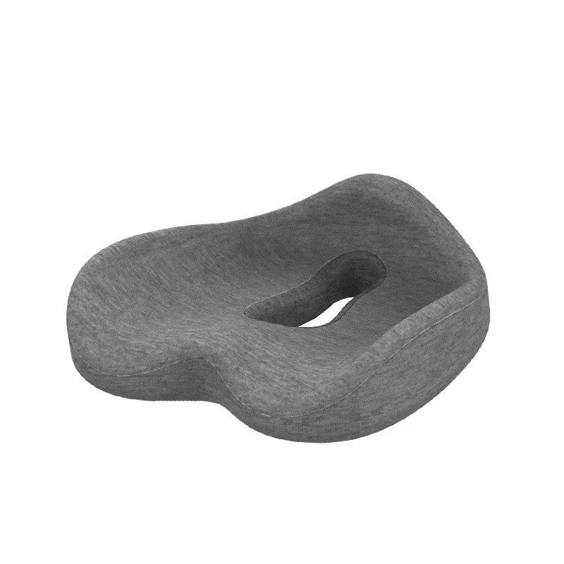 Memory foam seat cushion in light grey and navy blue on an office chair, 43x36x14cm