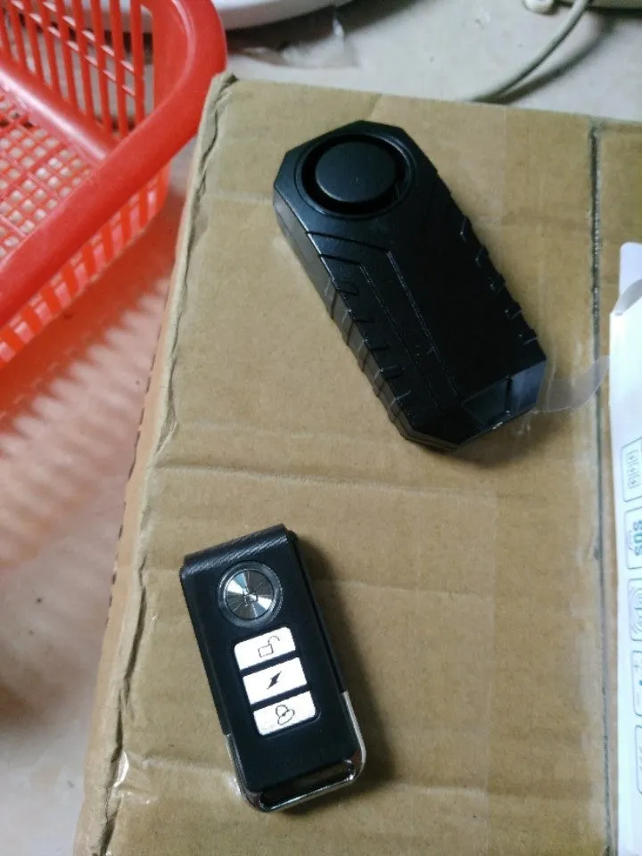 Elecpow bike alarm remote control in black with waterproof IP55 case and vibration sensor mounted on a bicycle frame