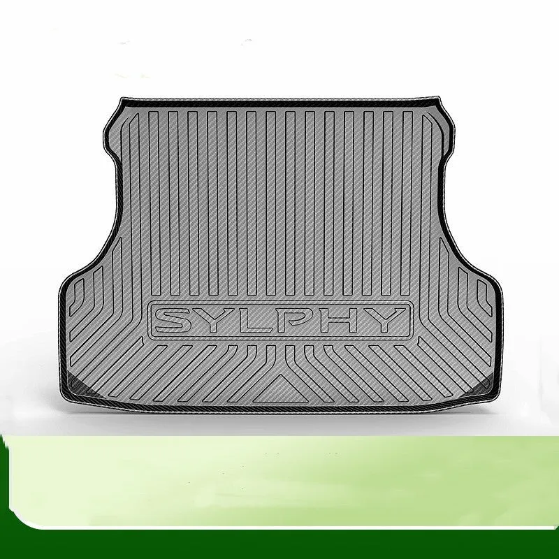 Black TPE car boot liner with carbon fibre pattern texture lying flat.
