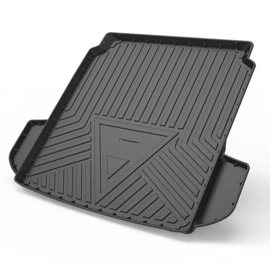 Black TPE car boot liner with carbon fibre pattern texture lying flat.