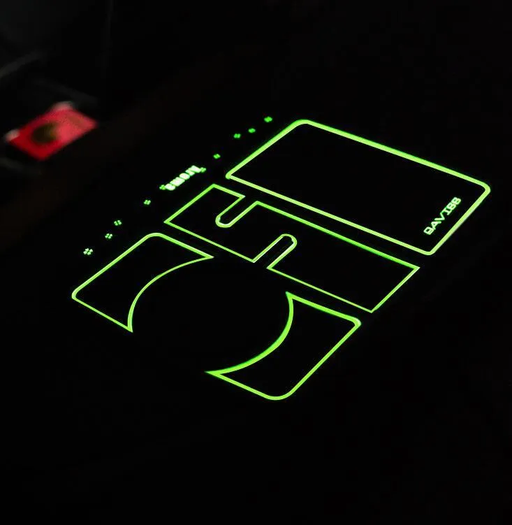 Non-slip car phone pad in black with red edge, showing 4-in-1 functions including phone holder and aromatherapy holes
