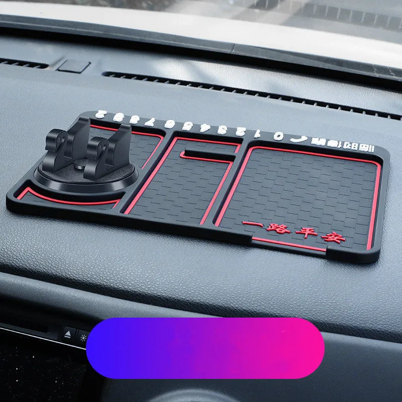 Non-slip car phone pad in black with red edge, showing 4-in-1 functions including phone holder and aromatherapy holes