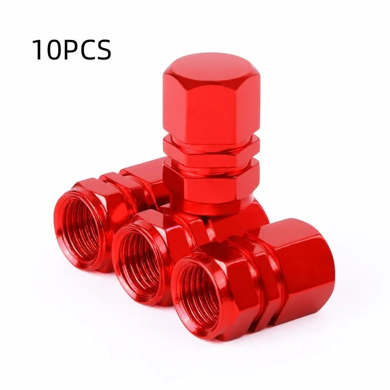 Set of ten aluminium alloy car valve caps in blue, red, silver, gold and black on a white background