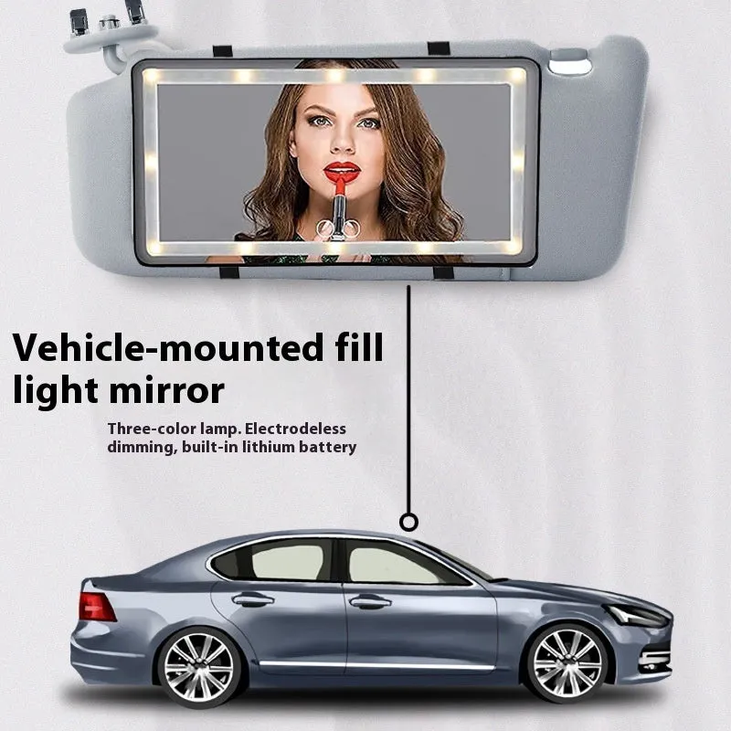 Car sun louver mirror with LED touch lamp clipped to sun visor, showing aluminium mirror and black light bars on four sides