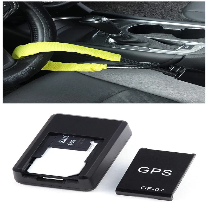 Small black magnetic GPS tracker device next to a USB charging cable.