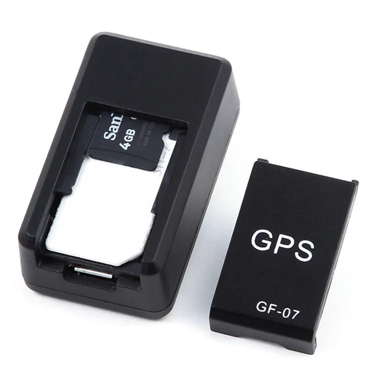 Small black magnetic GPS tracker device next to a USB charging cable.