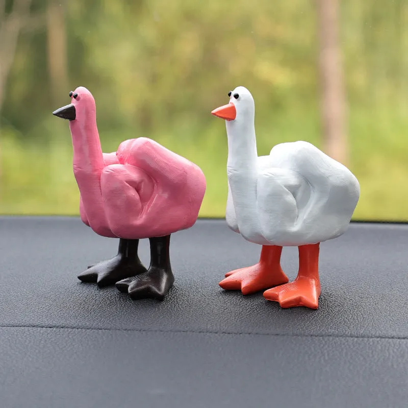 Creative middle finger duck cartoon resin ornament in beige, 50x77mm, on car centre console