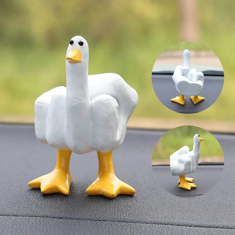 Creative middle finger duck cartoon resin ornament in beige, 50x77mm, on car centre console