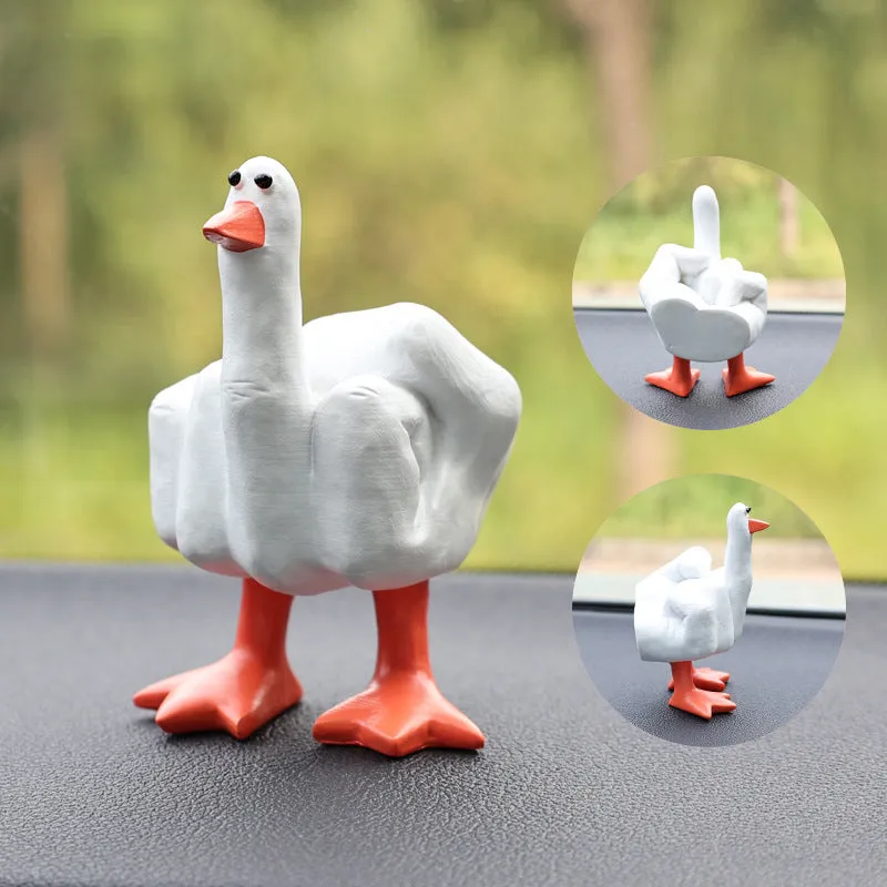 Creative middle finger duck cartoon resin ornament in beige, 50x77mm, on car centre console